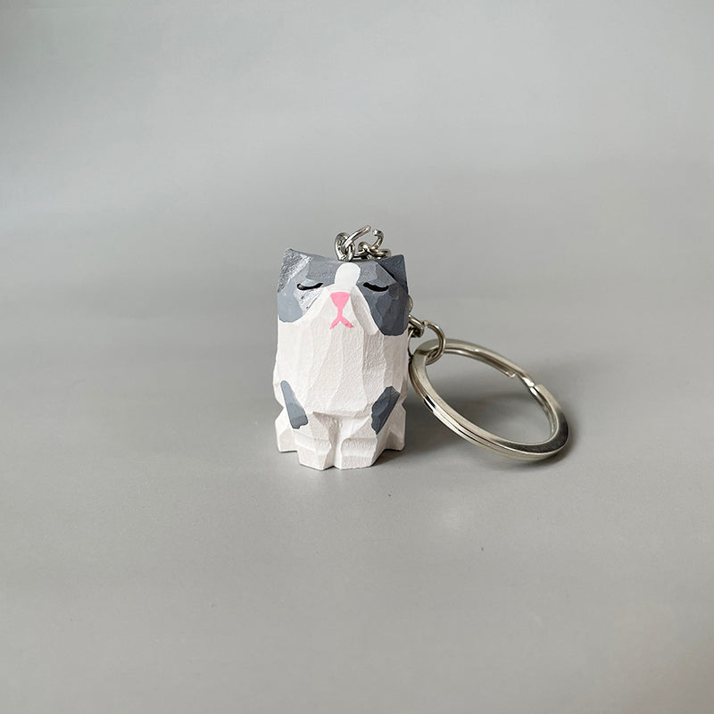 Detailed view of a British Shorthair style cute cat keychain.