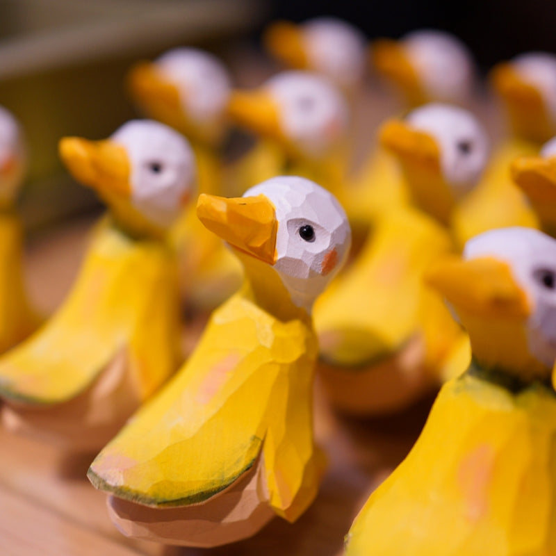 Banana duck statue, hand-carved and painted wooden figure.