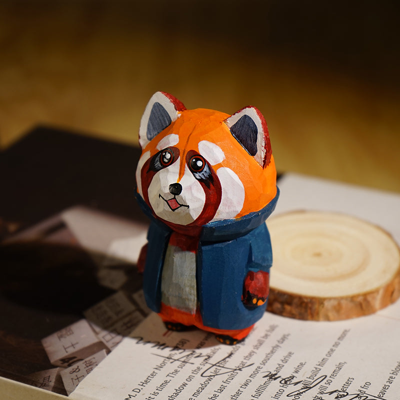 Artistic red panda wooden figurine with detailed carvings and cheerful color palette, perfect for home decor.