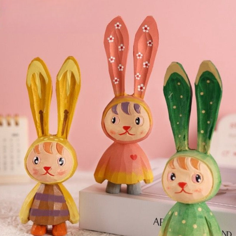 Decorative easter bunny wooden statuettes.