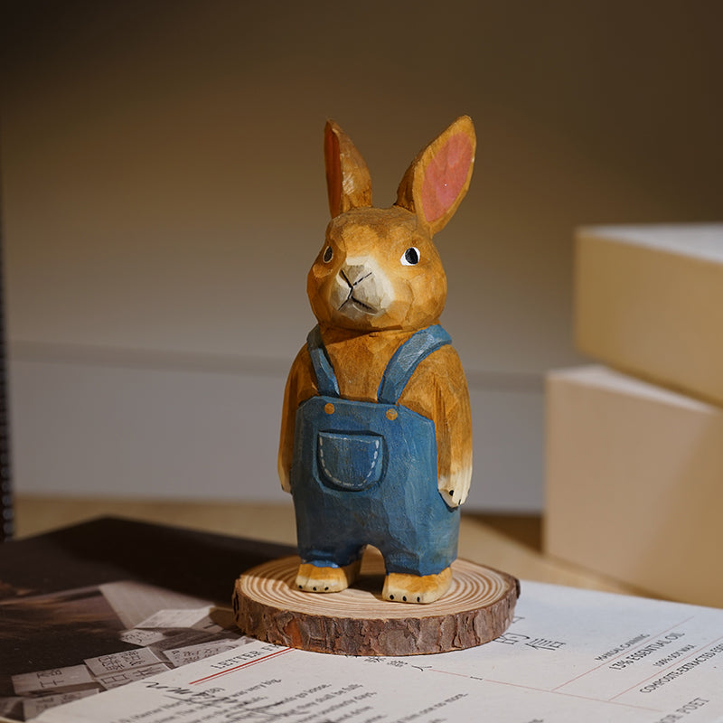 Bunny sculpture, wooden and hand-painted, come with a wooden base.