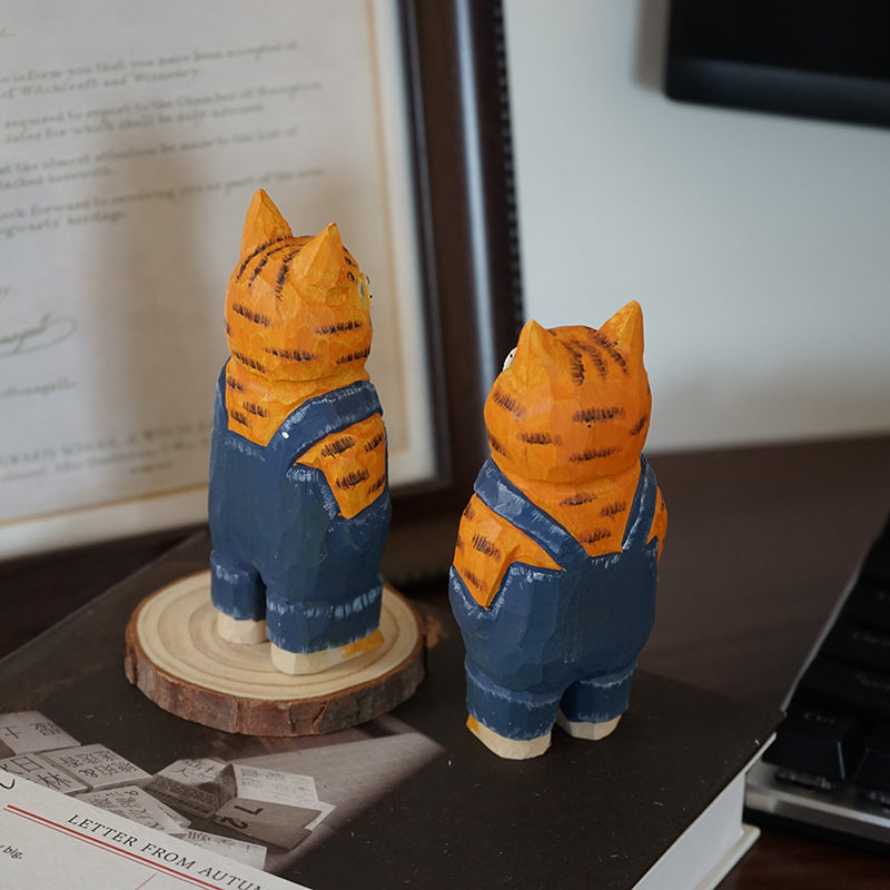 Back view of denim cat sculpture, hand-painted wooden figurine