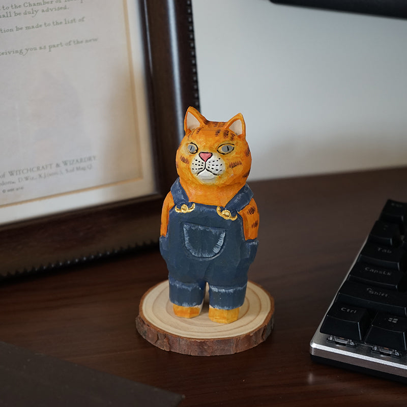 Close-up of denim cat sculpture, hand-painted wooden Figure