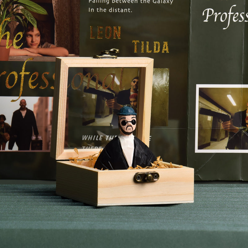 Decorative wooden figurines from the film Léon, uniquely hand-painted to capture the essence of the characters.