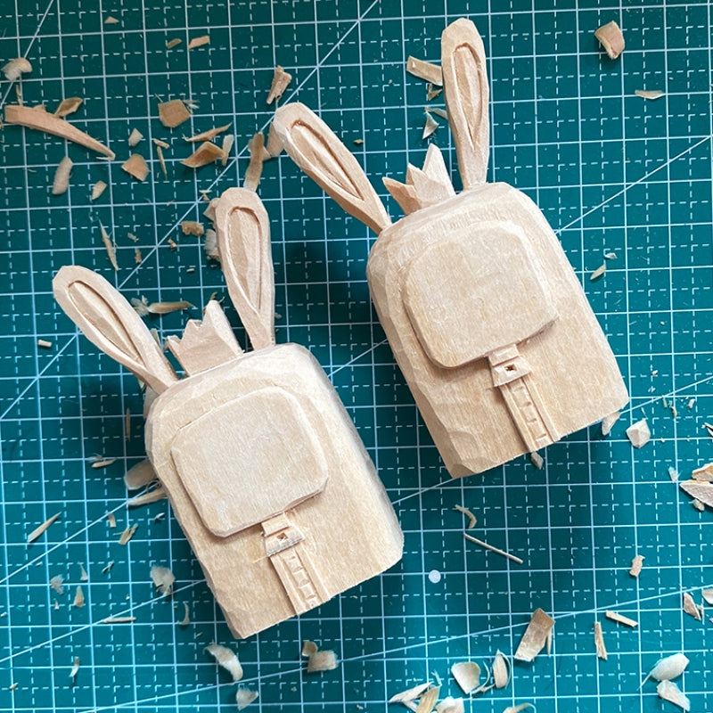 Square cartoon style bunny figures, unfinished.