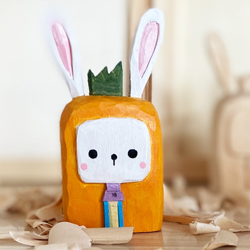 Square carrot color bunny figure.