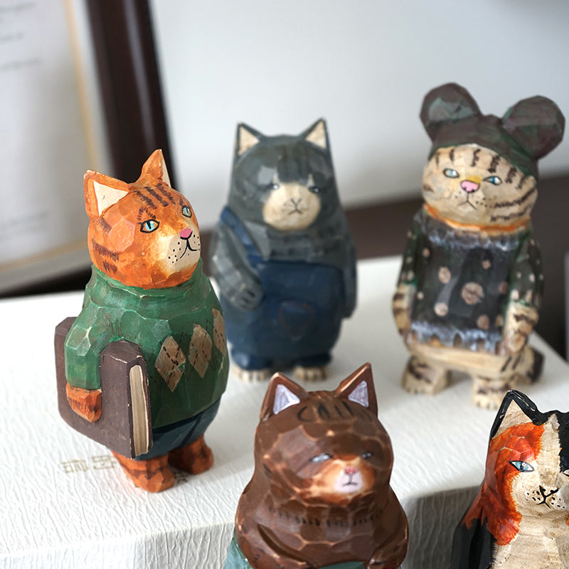 Detailed view of vintage cat figurine wooden sculpture