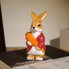 Female bunny figurine, hand-painted on wooden sculpture.