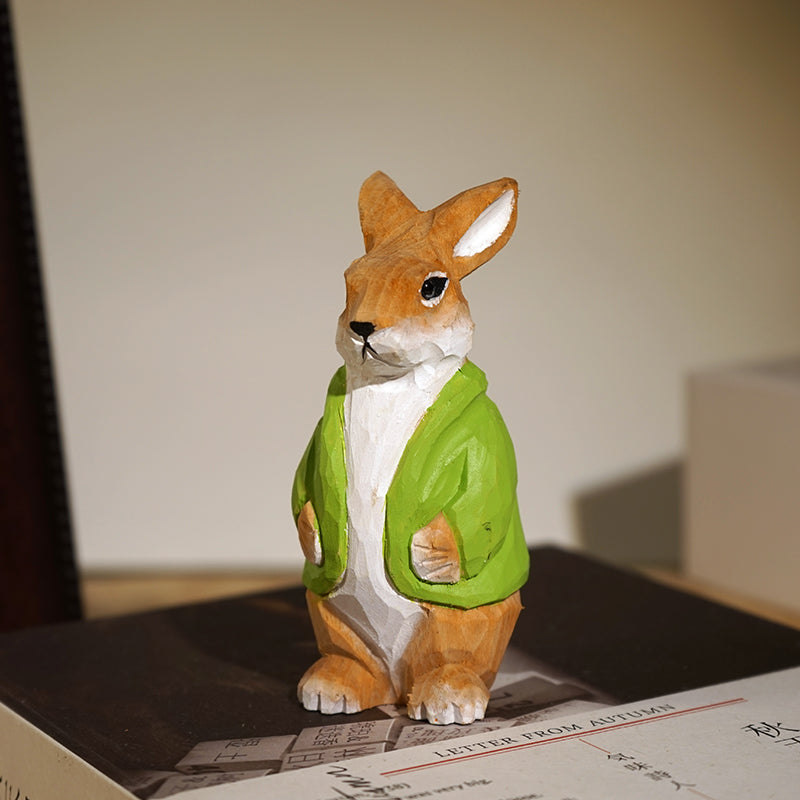 Male bunny figurine, hand-painted on wooden sculpture.