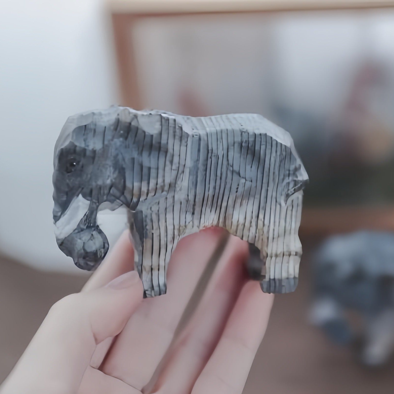 Wooden elephant statue, hand carved and painted from wood.