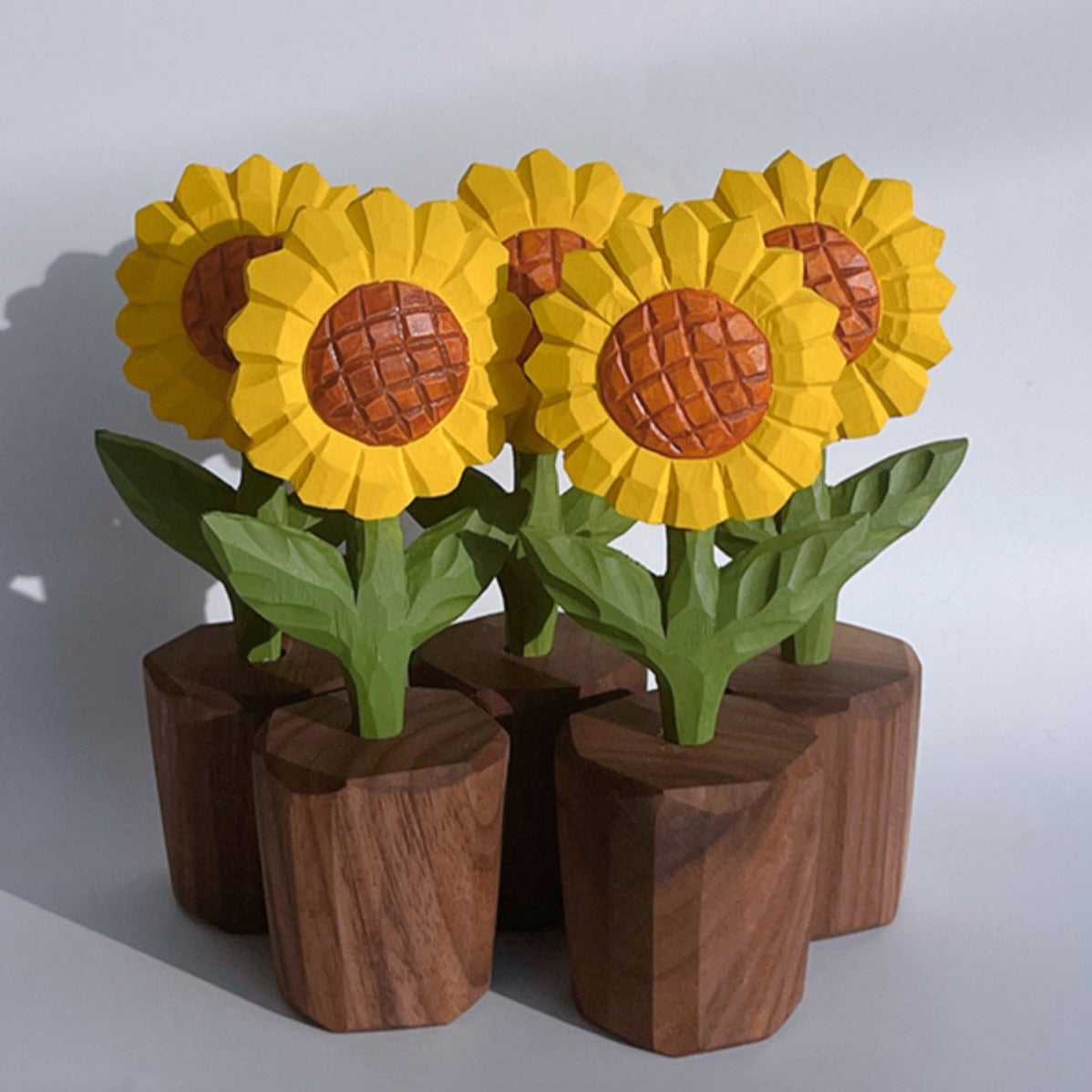 Sustainable decor wooden sunflower sculpture, perfect for rustic home settings.